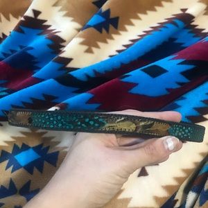 Unique hat band with feathers